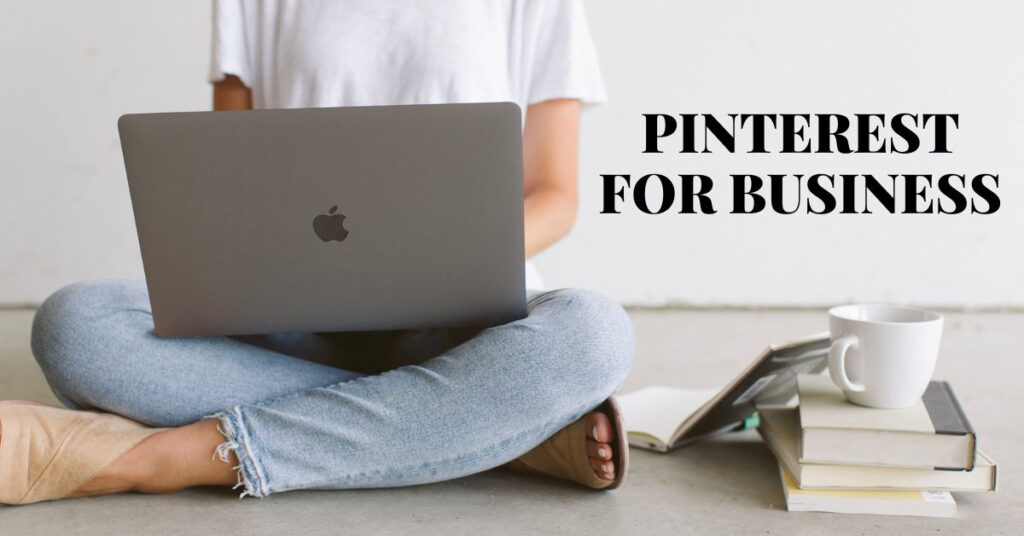 woman seated cross legged with macbook in lap with Pinterest for business text overlay